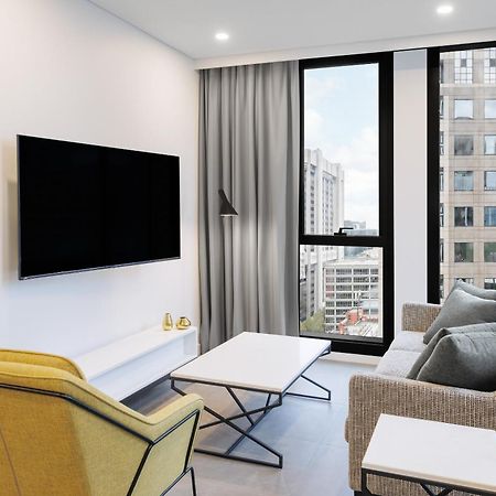 Meriton Suites Melbourne Exteriér fotografie A living room