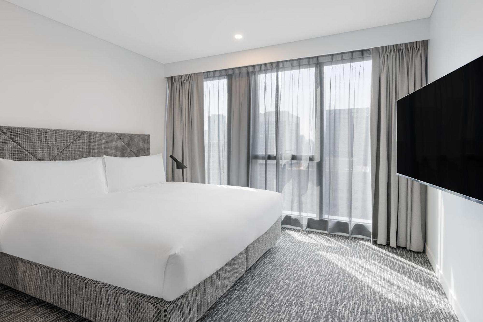 Meriton Suites Melbourne Exteriér fotografie A bedroom at the hotel