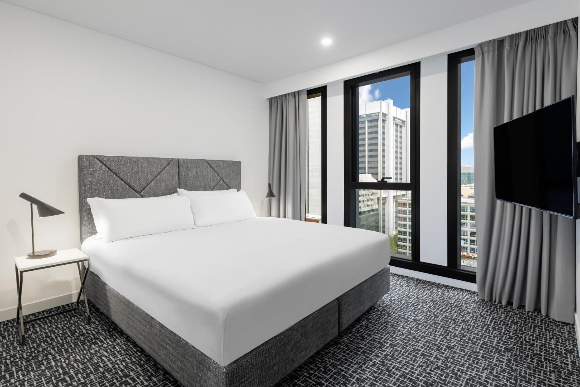 Meriton Suites Melbourne Exteriér fotografie A bedroom at the hotel